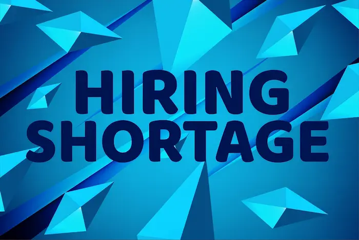 hiring shortage sign